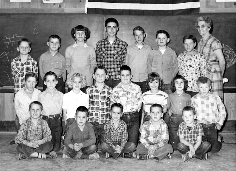 Erick Conard (first row, middle) and Frank Conard II (second row,second from left) at Buckeye School in Lycan, Colorado in 1955.