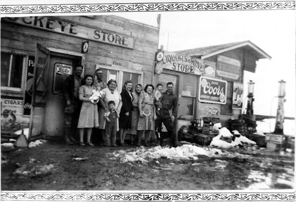 Iva Hazel Henry Conard Delaney Doyle standing in front of Buckeye Store with family