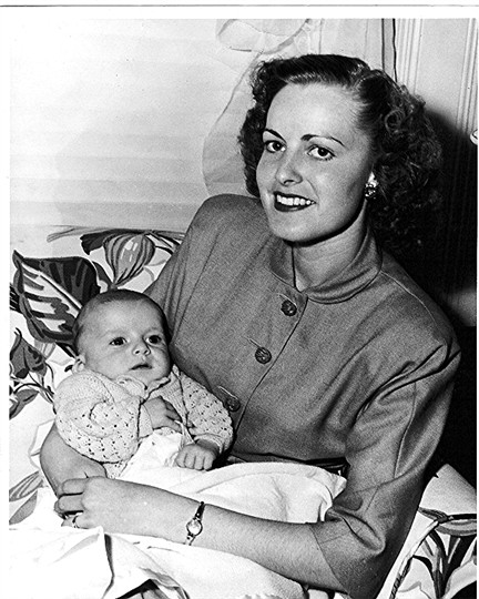 Billie Faye Waller Conard with her first born child, Frank W Conard, January, 1948.